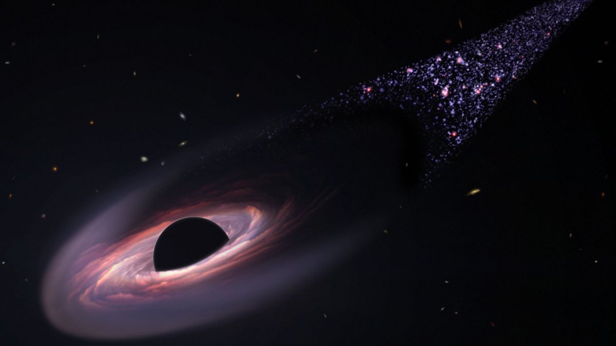 JWST atradimas: supermasyvi juodoji bedugnė sprūsta iš galaktikos ir drasko kosmosą